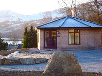 Loch Tay Woodland Cabins all furnished with a woodburning stove