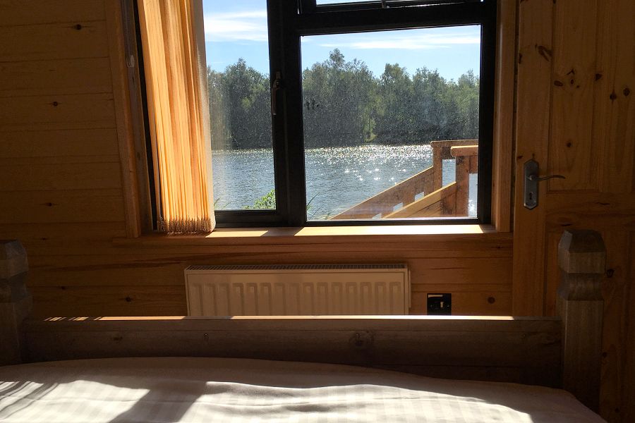 Woodlakes Cosy Cedar Lodge Bedroom View